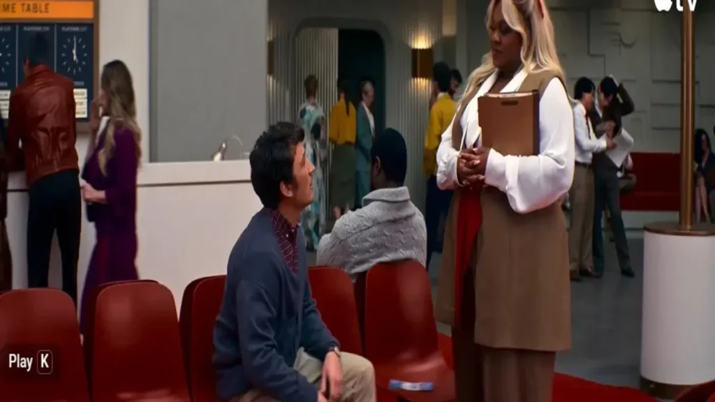 Scene from Eternity official trailer showing a tense moment in a futuristic waiting area on