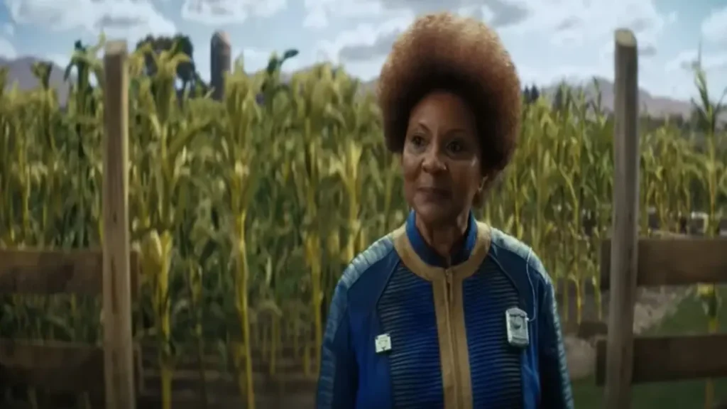 Fallout Season 1 Episode 5 The Past character standing in post-apocalyptic farmland
