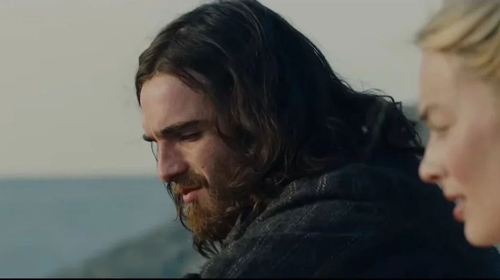 Wuthering Heights: An Exclusive Clip Warner Bros. Wuthering Heights exclusive clip showing two figures in a windswept moorland setting