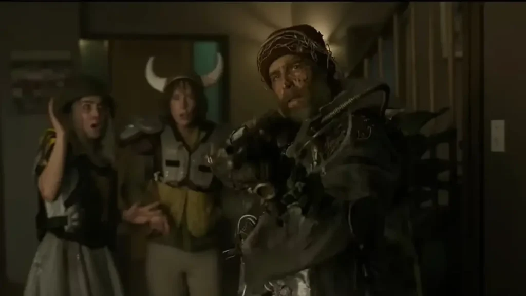 Armored enforcer confronts civilians in sci-fi action film Good Luck Have Fun Don’t Die (2025)