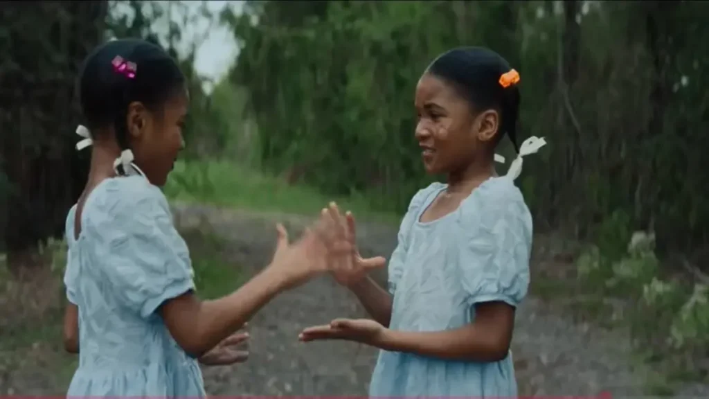 Is God Is Trailer Review: A Powerful First Look Two young girls facing each other in Is God Is official trailer scene symbolizing sisterhood and trauma