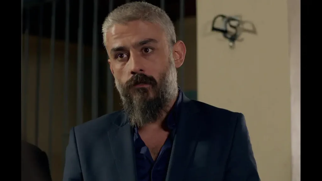 Kanbolat Görkem Arslan smiling during a theater performance