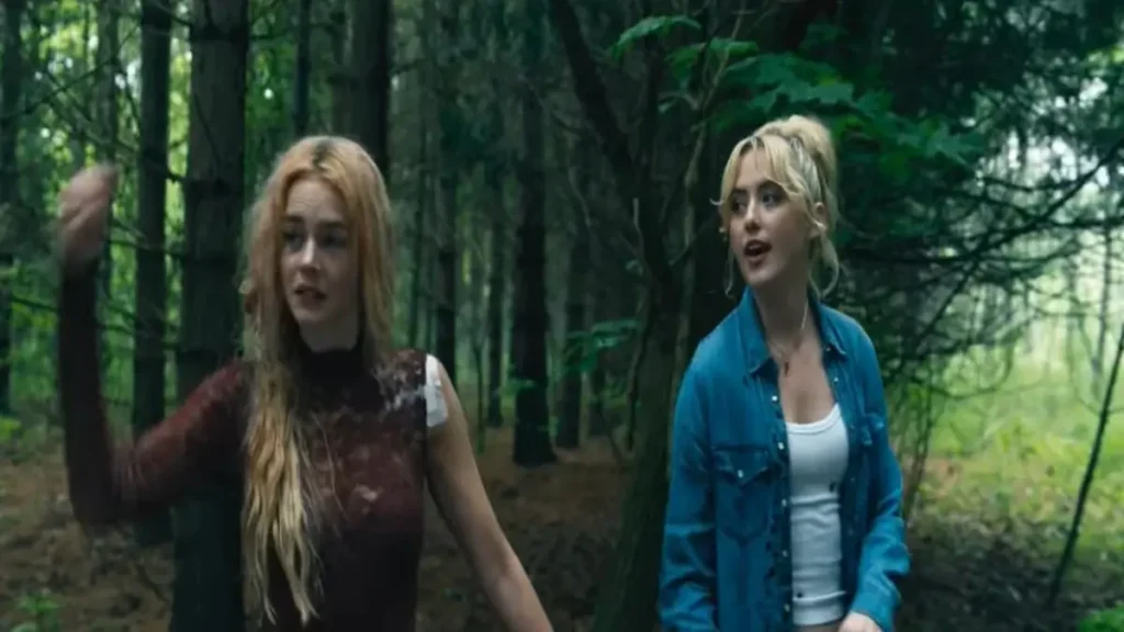 Ready or Not 2 Here I Come official trailer scene showing two women navigating a tense forest survival scenario