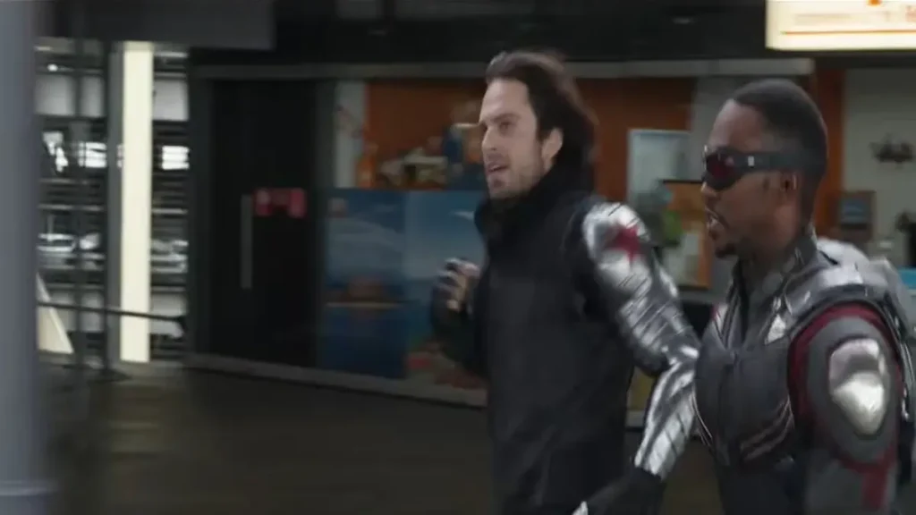 Civil War airport battle scene featuring two super-soldiers confronting Spider-Man