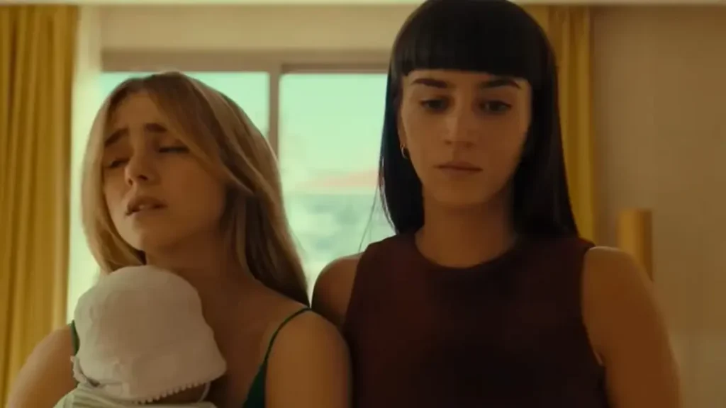 Two women holding a baby in a tense emotional scene from That Night Netflix trailer
