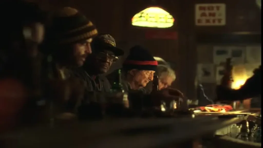 The Singers Official Trailer Review: Powerful Netflix Musical Drama The Singers official trailer scene showing performers seated at a dimly lit bar interior