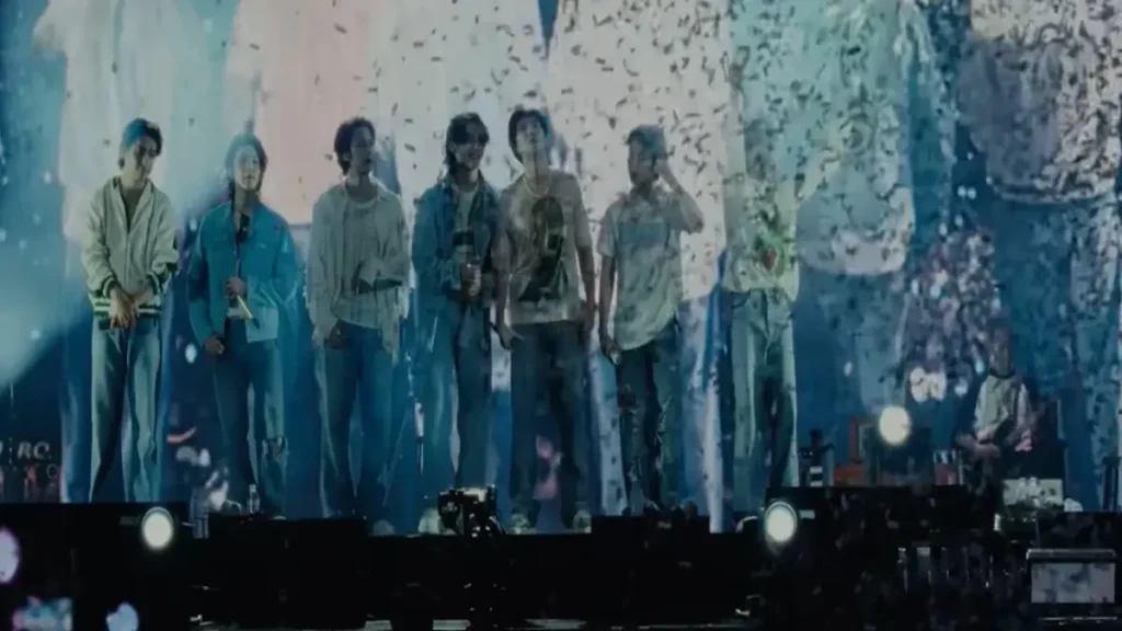 BTS performing on stage during The Comeback Live ARIRANG Netflix trailer with confetti and dramatic lighting