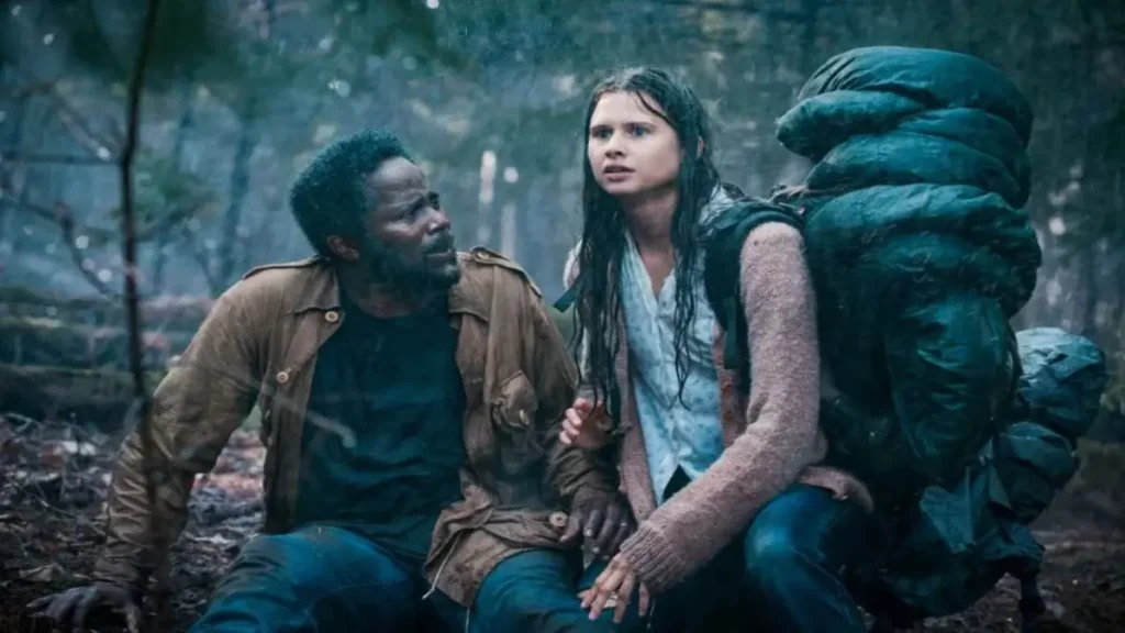 From Season 4 trailer scene showing two survivors hiding in the forest during a tense moment in the MGM+ horror series.