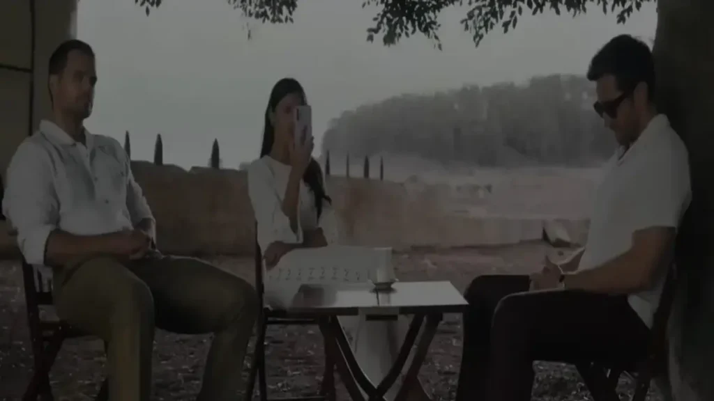 In The Grey 2026 movie trailer scene featuring Jake Gyllenhaal and Henry Cavill in a tense outdoor meeting