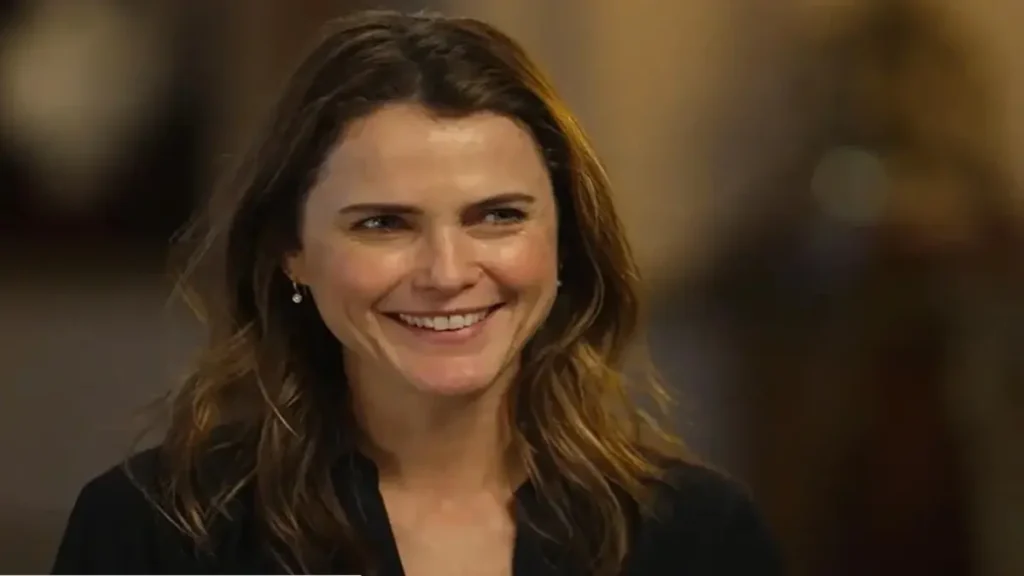 Keri Russell smiling during her SAG Awards acceptance speech at the 32nd Annual Screen Actors Guild Awards