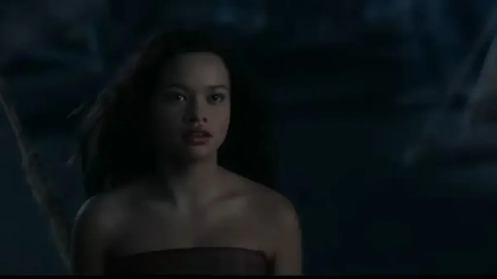 Moana standing in moonlit ocean scene from official Disney trailer