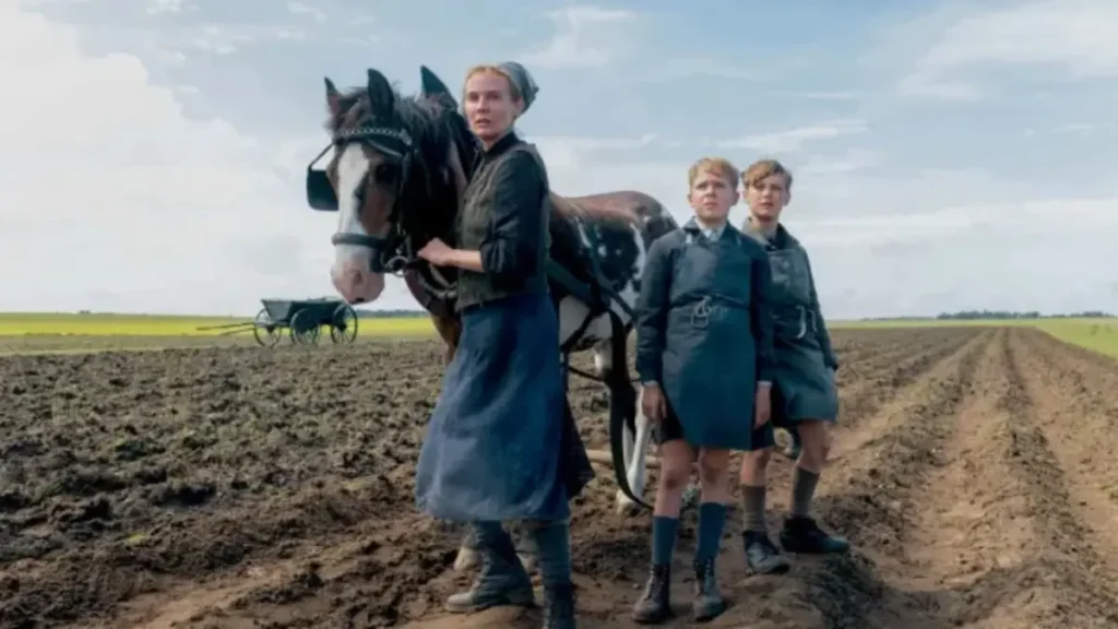 Woman with horse and children in barren field from Amrum trailer TIFF 2026