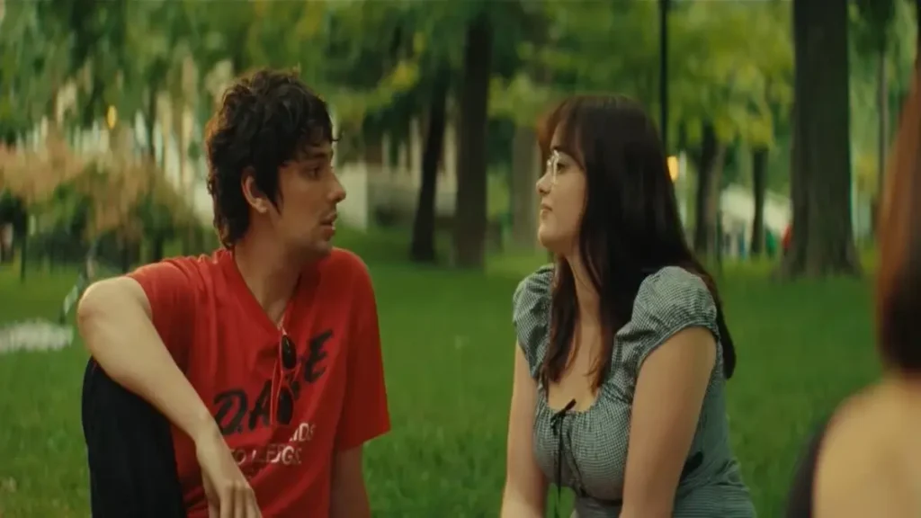 Mile End Kicks 2026 trailer scene showing two characters sitting outdoors in a reflective indie drama moment