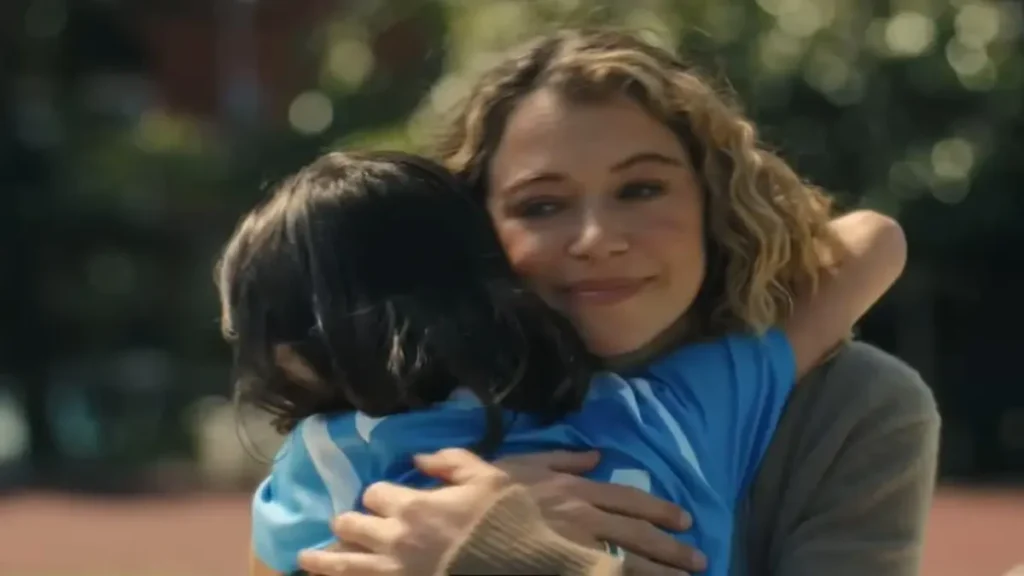 Maximum Pleasure Guaranteed: “The Spiral” Teaser Breakdown: A Psychological Thriller That Feels Intimate, Emotional, and Unsettling Woman hugging child in emotional scene from Maximum Pleasure Guaranteed The Spiral Apple TV+ teaser