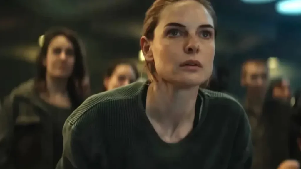 Silo Season 3 teaser scene showing intense female protagonist in dystopian underground setting