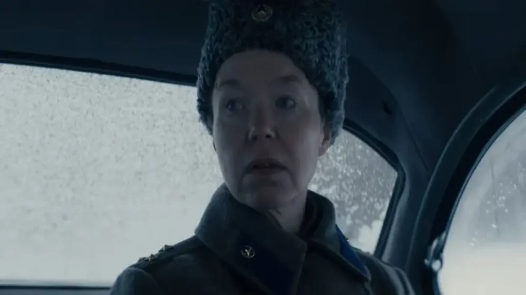 Star City trailer scene showing a tense character inside a dimly lit vehicle during a cold, isolated moment