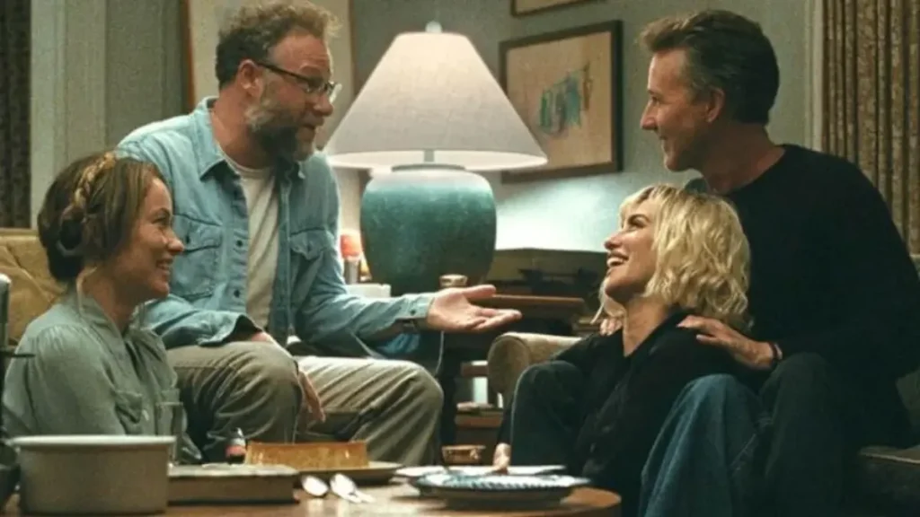 The Invite A24 movie scene showing intense group conversation in a living room