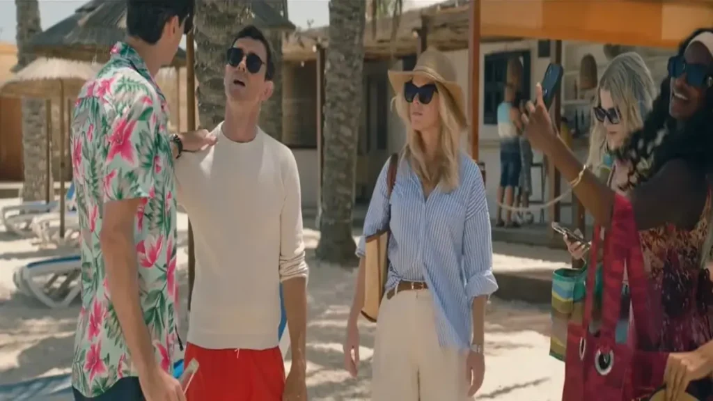 Cast members in a tropical beach scene from the CHUM Official Trailer (2026)