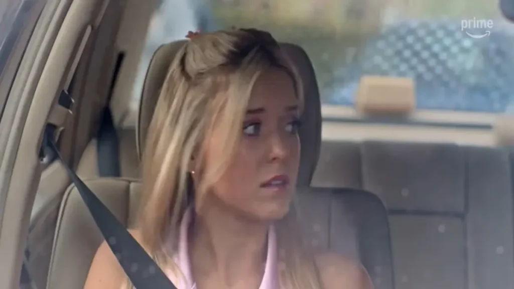 Blonde young woman sitting in a car looking anxious in Elle official teaser on Prime Video
