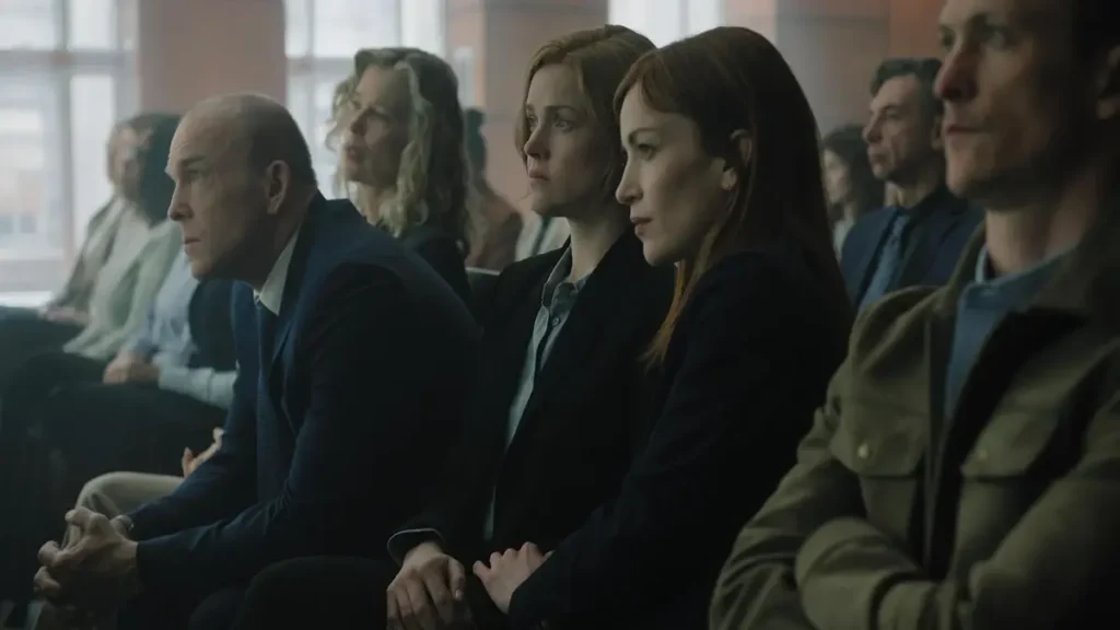 Cast members seated during an intense courtroom scene in Netflix’s I Will Find You teaser.