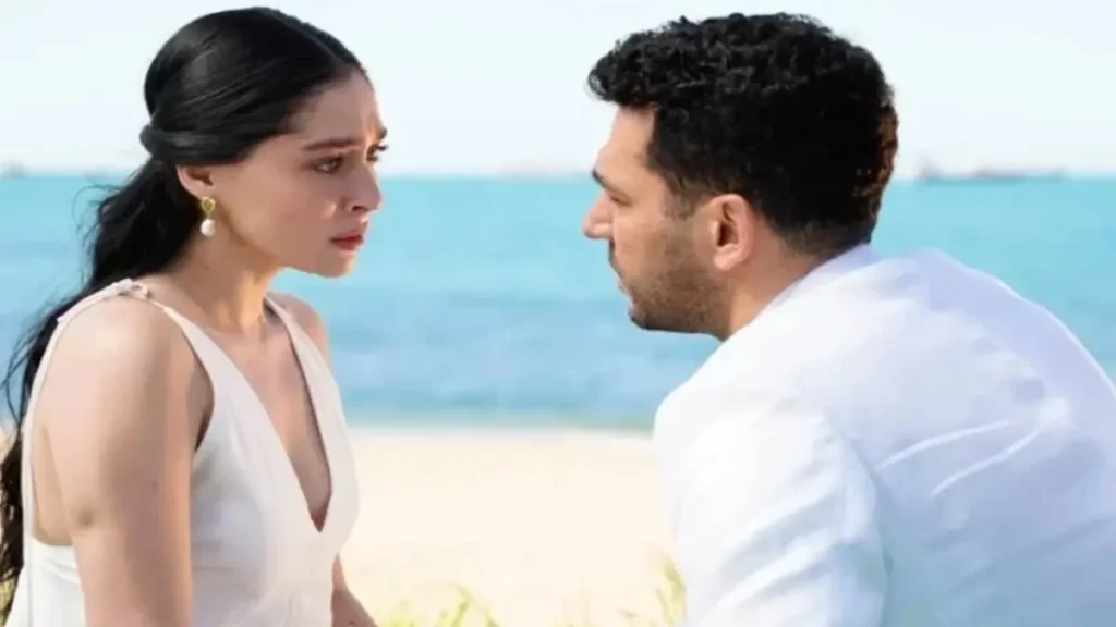 Zeynep and Serhat emotional beach scene from Güller ve Günahlar episode