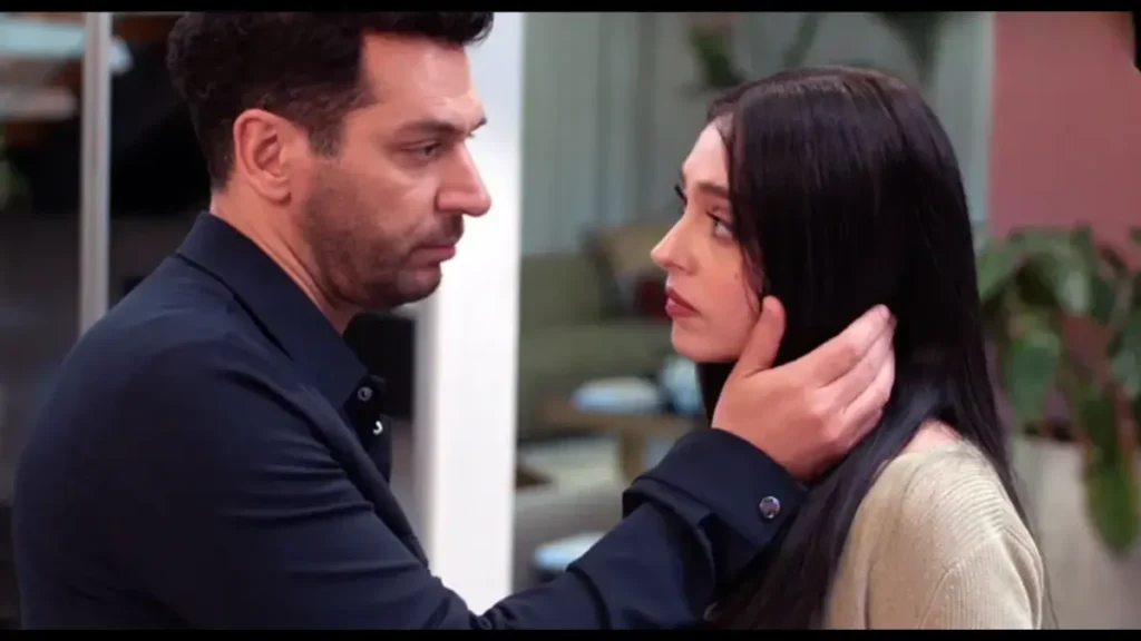 Serhat gently holding Zeynep’s face in an emotional scene from Gull ve Gunhalar episode 27