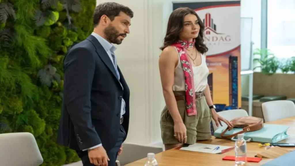 Ayça Ayşin Turan and Ekin Koç in a meeting scene from Probable Love Turkish romantic comedy series